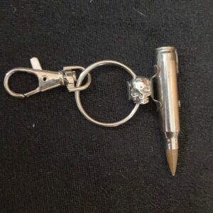 Silver Bullet Keychain with Skull Accent